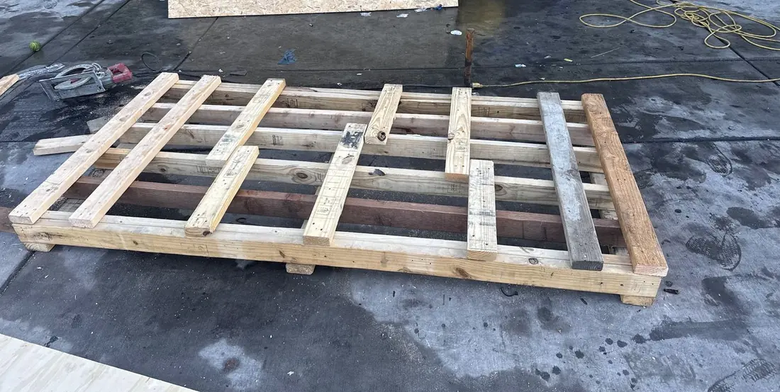 Custom reinforced wooden pallet under construction by Ontrack Moving for hoisting biosafety cabinets in a Bay Area biotech lab move